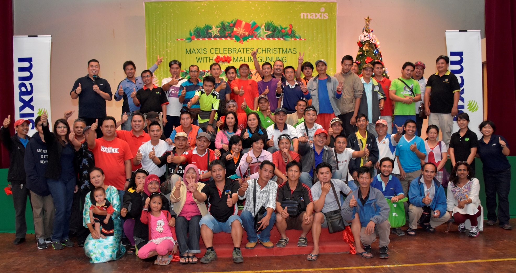 Photo 1: Over 100 members of the Mount Kinabalu Guides Association and their families gathered at Maxis’ Christmas event held at Kinabalu Park, Kundasang