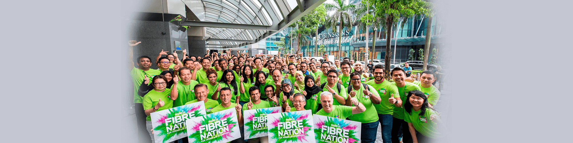 Maxis employees help activate brand new high-speed fibre